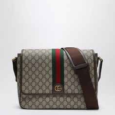 Beige And Ebony Gg Supreme Fabric Shoulder Bag From Gucci Featuring Brown Leather Detailing, Gold-Tone Metal Hardware, A Flap Closure With Metallic Gg Detailing And A Green/Red/Green Web Ribbon, A Zip Pocket On The Back, An Internal Flat Zip Pocket And An Adjustable Shoulder Strap. Width 34 Cm X Height 24 Cm X Depth 9,5 Cm Adjustable Shoulder Strap Length Min 60 Cm - Max 125 Cm Size Type: Int Material: Polyester Sku: 2f-792119facjq/P_guc-9741_100 Welcome To The Official Luosophy Poshmark Closet! Gucci Belt Bag, Green Web, Cheap Gucci, Investment Bags, Web Detail, Leather Detailing, Guccio Gucci, Gucci Shoulder Bag, Gorgeous Bags