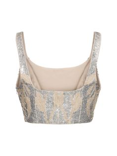 Fixed shoulder straps. Concealed side zip closure. Embellished with sequins. All over embroidered pattern placement may vary. Model is wearing a sizeS Linen Crop Top, Versace Brand, Linen Crops, Ski Accessories, Flat Espadrilles, Heeled Loafers, White Crop Top, Brunello Cucinelli, Manolo Blahnik