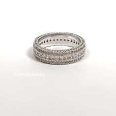 Stunning 18kgp (White Gold) 3 Row Cubic Zirconia Eternity Band Filled With Horizontal Pave Cubic Zirconia Stones! Stones Cut In Both Round & Emerald Cut~ Light Reflects From Various Angles~ Fits Size 9 0.4” Wide New / Nwot 18 Karat White Gold Plated Brass / Cubic Zirconia Stones Imported New Sale Price With Discounted Shipping ~ ~ ~ ~ ~ ~ ~ ~ Got A Few Minutes? Don’t Hesitate To Head Over To My Page Where You’ll Find Over 100 Jewelry Items! Dazzling White Eternity Band With Vs Clarity, White Cubic Zirconia Round Cut Eternity Band, White Cubic Zirconia Eternity Band With Round Cut, White Round Cut Cubic Zirconia Eternity Band, White Cubic Zirconia Diamond Ring For Promise, White Cubic Zirconia Diamond Ring Channel Set, White Eternity Band With Vvs Clarity For Promise Ring, White Diamond Cut Eternity Band, White Channel Set Cubic Zirconia Ring