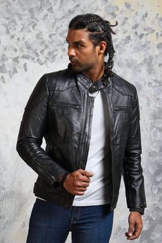 Black David Beckham Leather Jacket Mens biker David Beckham leather jacket is manufactured with 100% genuine cowhide leather of premium quality. This black leather jacket features 4 external and 2 internal pockets with viscose lining, snap-tab collar and front YKK zip closure. Outfit Type: Biker Jacket Material:    Outer: Real Leather    Type: Cowhide    Inner: Viscose Color: Black Pockets: 2 chest, 2 Side, 2 Inside Collar: Snap-tab collar Size-Chart Black Cafe Racer Leather Jacket For Biker Events, Quilted Leather Biker Jacket, Fitted Black Cafe Racer Leather Jacket, Black Quilted Biker Leather Jacket, Black Fitted Cafe Racer Leather Jacket, Luxury Men's Biker Jacket With Leather Lining, Black Quilted Leather Biker Jacket, Black Cafe Racer Leather Jacket With Long Sleeves, Masculine Fitted Black Leather Jacket