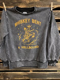 Country Deep Whiskey Bent Hellbound Vintage pigment acid washed crew split tail sweatshirt available in Acid vintage wash Black SIZING Small- Underarm Pit to Pit- 21 inches Medium- Underarm Pit to Pit 22 inches Large Underneath Pit to Pit 23 Inches This relaxed fit Crew neck sweat shirt is mineral washed to look and feel just like your favorite vintage sweatshirt. Split tail at the bottom Made from 100% ringspun cotton, the fabric is substantial but washed down and exceptionally soft. Broken in Casual Country Outfits, Mom Fall, Baby Crop Top, Western Style Outfits, Pretty Shirts, Sweatshirt Short Sleeve, Workout Sweatshirt, Country Outfits, Good Looking Men