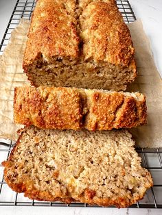 three slices of banana bread sitting on top of a cooling rack