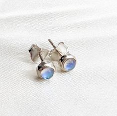 Mystic quartz stud earrings. Set in sterling silver, these are super verstile. They stand alone but also work well as a second or third lobe piercing stud to curate your look. Also available in gold vermeil. Shop our full earring collection at: https://tanviblue.etsy.com?section_id=49237495 Minimalist Everyday Earrings With Bezel Setting, Silver Moonstone Birthstone Earrings, Silver Moonstone Earrings With Birthstone, Silver Birthstone Earrings With Moonstone, Minimalist Nickel-free Moonstone Earrings, Minimalist Nickel Free Moonstone Earrings, Minimalist Silver Earrings With Bezel Setting, Silver Sterling Silver Earrings With Round Stone, Dainty Silver Moonstone Earrings