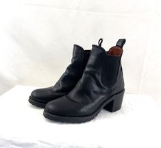 Great vintage boots by FRYE.. Amazing! I don't see a size, I can get them on my women's 9 1/2 feet but they are too small. Maybe a women's 8 or 8 1/2? See measurements Sabrina Chelsea style Nice soles! Minor heel wear MEASUREMENTS: heel height: ~2 1/2" toe to heel on the underside of the boots: 10" widest part of the sole: 3 3/4" Shaft height: ~7" Stacked Heel Boots, Frye Boots, Vintage Boots, Stacked Heel, Chelsea, Heel Height, Shoe Boots, Bathing Beauties, Boots