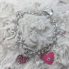 New charm bracelet set Brand new with tags. Smoke free home. Silver tone bracelet with pink heart charms Jewelry Bracelets New Charmed, Tiffany Heart, Bracelet Jewelry, Heart Charm Bracelet, Pink Heart, Charm Jewelry, Heart Charm, Womens Jewelry Bracelets, Bracelet Set