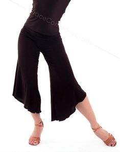 "Stylish and comfortable dance capri pants made of flowy knit. The relatively wide leg of the trousers, the length to the mid-calf gives freedom and ease to your movements. Capri pants go well with form-fitting tops. INDIVIDUAL TAILORING If you want to change the style of clothes (shorten, make it longer, add a sleeve, etc.) you can order individual tailoring from us. You can also individually order ANY SIZE of clothes from us up to size XXS or over size 7X. Our consultant will be happy to tell Versatile Fitted Harem Pants For Summer, Versatile Stretch Capri Pants, Elegant Stretch Capris For Summer, Elegant Stretch Summer Capris, Stretch Wide Leg Dance Bottoms, Stretch Dancewear Bottoms For Spring, Stretch Wide Leg Bottoms For Dance, Spring Dancewear Bottoms With Stretch, Versatile Fitted Yoga Pants For Summer