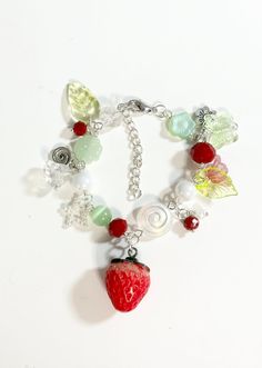 adjustable 8" Adjustable Multicolor Unique Charm Bracelet, Unique Adjustable Multicolor Charm Bracelet, Unique Red Beaded Bracelets For Gift, Trendy Green Handmade Charm Bracelet, Trendy Handmade Green Charm Bracelet, Casual Red Jewelry For Gifting, Casual Red Charm Bracelet Gift, Trendy Red Beaded Bracelets As Gift, Casual Red Jewelry For Gifts