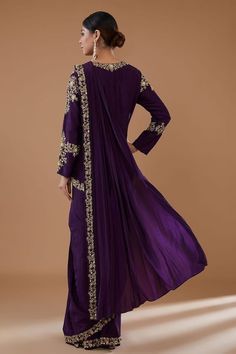 Purple pre-draped saree with zari embroidered floral vine motifs embellished by sequins. Comes with zari floral embroidered blouse highlighted by cut-out hem. - Aza Fashions Eid Evening Pre-draped Saree With Resham Embroidery, Traditional Drape Pre-draped Saree With Dabka Work, Embroidered Pre-draped Saree With Long Sleeves For Reception, Evening Traditional Wear With Resham Embroidery In Tissue Silk, Chanderi Evening Set With Dupatta, Silk Anarkali Traditional Evening Wear, Evening Chanderi Set With Dupatta, Evening Sets With Dupatta In Chanderi, Semi-stitched Draped Blouse Piece For Eid