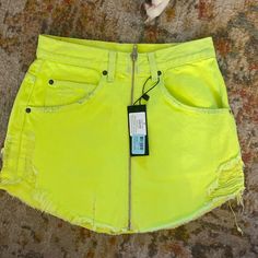 Jean Zip Up Neon Green Mini Skirt Brand New With Tags Trendy High Waist Yellow Skirt, Trendy High-waist Yellow Skirt, High Waist Yellow Skirt For Spring, Yellow High-waist Skirt For Spring, Casual High Waist Yellow Mini Skirt, Yellow Cotton Mini Bottoms, Casual Yellow High Waist Mini Skirt, Casual Yellow High-waist Mini Skirt, Yellow Mini Skirt With Pockets