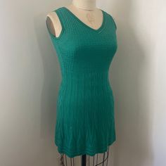 Missoni tennis dress  54% cotton 46% viscose Labeled size 36 Measurements taken flat and unstretched double when necessary and allow for stretch  Shoulder to shoulder 12.5" Pit to pit 13.5" Shoulder to hem 32" Green Fitted Sleeveless V-neck Dress, Fitted V-neck Tennis Dress, Fitted Green Sleeveless V-neck Dress, Green Stretch V-neck Sleeveless Dress, Green V-neck Stretch Sleeveless Dress, Green V-neck Sleeveless Stretch Dress, Casual Fitted V-neck Tennis Dress, Fitted Casual V-neck Tennis Dress, Casual Fitted Tennis Dress With V-neck