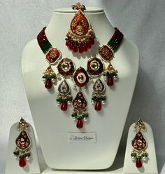 Meena kundan thappa set with matching earrings and tikka with drop bead details  Available in two colours  Deep red Soft pink  Measurements:  Earrings: 8cm drop, 3cm width Tikka : 16cm drop, 4cm width All our products are neatly wrapped  Perfect as a gift Every item is sanitised and bubble wrapped before dispatch  For hygiene purposes our jewellery is non- refundable  Please note- all our images are raw, colour may differ slightly due to lighting  All measurements are approximate Ladies Jewellery, Rose Pale, Wedding Jewellery Necklace, Drop Beads, Wedding Necklace, Deep Red, Matching Earrings, Soft Pink, Necklace Set