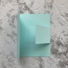 an empty piece of paper sitting on top of a counter