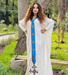 Pretty Habesha Dress with Blue Embroidery Habesha Dress, Ethiopian Dress, Wedding Dress Chiffon, Dresses Chiffon, Blue Embroidery, Wedding Dresses Simple, Turks And Caicos Islands, Cotton Thread, Xl Dress