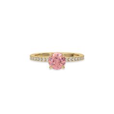 This ring is made with a fancy Pink round solitaire diamond set in four-prong setting, and is complemented by a round pave diamonds band.Details: - Made to Order- Focal Diamond Weight: 1.00 CT, 1.25 CT, 1.50 CT, 1.75 CT, 2.00 CT, 2.50 CT, 3.00 CT- Accent Diamond Weight: 0.22 CT - No Of Diamonds: 19- Diamond Type: Lab Grown Diamond (CVD, HPHT)- Diamond Cut: Round- Diamond Clarity: VS - Focal Diamond Color: Fancy Pink- Accent Diamond Color: Colorless (DEF)- Setting Type: Prong and Pave- Band Thick Promise Ring With Side Stones, Rose Gold Diamond Ring With Pave Setting, Diamond Ring With Side Stones For Gift, Classic Pink Round Diamond Ring, Fine Jewelry Diamond Ring With Side Stones For Gift, Classic Pink Diamond Ring, Pink Moissanite Diamond Ring With Brilliant Cut, Pink Diamond Rings With Pave Setting, Pink Brilliant Cut Moissanite Diamond Ring