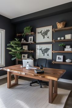 a home office with black walls and wooden desk