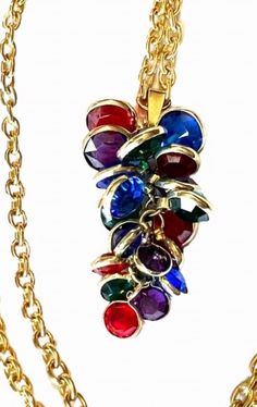 Vintage Bezzle colored Gold hanging Necklace. This is multicolored and will match everything. In great preowned condition Multicolor Crystal Necklaces For Parties, Multicolor Jeweled Costume Jewelry Necklaces, Multicolor Jeweled Necklace For Party, Rainbow Multi-stone Jewelry For Party, Crystal Multi-stone Necklace For Parties, Party Crystal Multi-stone Necklace, Party Multi-stone Crystal Necklace, Rainbow Multi-stone Party Jewelry, Multicolor Crystal Necklaces With Colorful Beads For Party