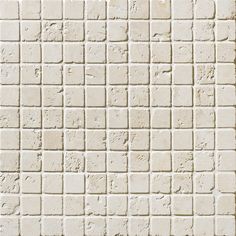 a white brick wall that is made up of small squares