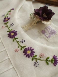 a close up of a cloth with flowers on it