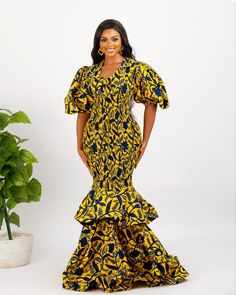 Embrace the bold, embrace the beautiful with this gorgeous Jelani mermaid dress, perfect for a wide range of occasions, including dates, weddings, church, parties, red carpets and more. You can opt for a His & Hers Set to make a stylish statement together. Each piece is meticulously handcrafted using 100% African wax cotton and plain fabric, ensuring the highest quality and authenticity. At our shop, we take pride in creating custom designs tailored just for you. You're welcome to request any customization, whether it's adjusting the length to petite or tall, adding or removing elements from the design, or choosing a different fabric to suit your preferences. To ensure a perfect fit, you can provide us with your measurements if you have them, or simply select your size from our accurate si Fitted Fishtail Maxi Dress For Wedding, Fitted Mermaid Silhouette Evening Dress, Fitted Fishtail Gown, Elegant Fitted Fishtail Gown, Fitted Floor-length Mermaid Dress With Ruffles, Fitted Gown With Mermaid Hem, Long Mermaid Dress With Fitted Bodice For Evening, Mermaid Evening Dress With Fitted Bodice, Fitted Bodice Mermaid Silhouette Evening Dress