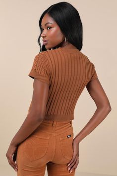 Your autumn style will be truly special a with trendy must-have like the Lulus Modish Ways Rust Brown Cable Knit Short Sleeve Sweater Top! This soft and stretchy sweater boasts a variety of classic designs, including cable, seed, and ribbed knit textures (plus pierced detailing), that makes this piece truly unique. A timeless crew neckline and a fitted, cropped bodice are framed by cute short sleeves, while contrasting ribbed knit trim at the neckline, cuffs, and hem completes the look. Fit: Thi Brown Fitted Knitted Top, Fitted Brown Knitted Top, Fitted Soft Knit Cropped Sweater For Fall, Brown Knitted Crew Neck Top, Trendy Fitted Cable Knit Top, Fitted Textured Knit Cropped Sweater For Fall, Trendy Ribbed Crew Neck Cardigan, Trendy Fitted Knit Sweater, Stretch Trendy Cardigan