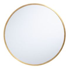 a white and gold round mirror on the wall with an empty space to put your own image