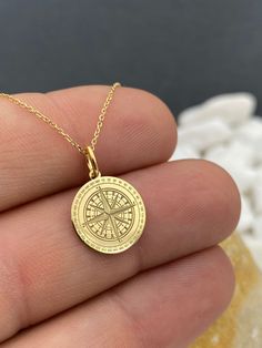 "Compass Necklace in 14k Solid Gold, Delicate Pendant, Gift for Women, Gold Jewelry, Travel Inspiration, Layering Necklace 14k Solid Gold Choose What Size You Want the Pendant Using The First Option Box Choose If you Want Thinner, Thicker  Or Without Chain Using The Second Option Box Photos Are For The 0.5 inch Diameter Pendant Pendant thickness : 0.5mm  Contact us if you want it thicker Inner diameter of jump ring : 4mm Contact us if you need it bigger              No1 chain width : 0.87mm                 No2 chain width : 1.30mm     ♥  Material of pendant and chain: Solid Gold k14  ♥  Packaging: All of our jewelry are beautifully boxed and ready for gifting For more personalized designs take a look here: ♥ www.etsy.com/listing/736955132 ♥ www.etsy.com/listing/819494857 ♥ www.etsy.com/lis Spiritual Round Recycled Gold Jewelry, Recycled Gold Spiritual Jewelry, Spiritual Jewelry In Recycled Gold, Spiritual Recycled Gold Jewelry, Spiritual 14k Gold Charm Necklaces With Coin Pendant, Spiritual 14k Gold Round Pendant Jewelry, Spiritual 14k Gold Jewelry Stamped 14k, 14k Gold Spiritual Round Pendant Jewelry, Spiritual 14k Gold Round Pendant