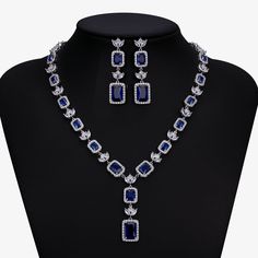 Stunning Sapphire Blue CZ Wedding Jewelry Set Complete your fabulous wedding day look with our 'something blue" Sapphire CZ necklace and earring set. This glamorous platinum silver plated jewelry set is adorned with brilliant AAAAA quality clear and sapphire blue CZ crystals that will add dazzling sparkle to any wedding or special occasion ensemble. Size: The necklace is about 17 1/2" long and the pierced earrings are about 2" long. Color: Silver/Sapphire Blue/Clear. Style: ne1010S-S. Also avail Quinceanera Tiaras, Formal Jewelry, Cz Necklace, Necklace And Earring Set, Silver Plated Jewelry, Party Jewelry, Prom Party, Wedding Jewelry Sets, Sapphire Blue