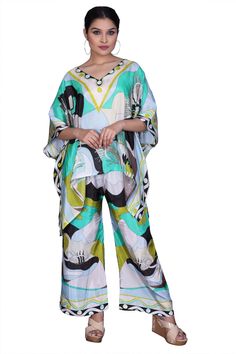 With every new design, Style it with something equally as floaty. Perfect for evenings spent exploring new cities on vacation. Made from silk that drapes beautifully through the wide legs, they're printed with artful blocks of color.Comfortably fits those who are between a size Small-3XLargeFabric : SilkLightweight, non-stretchy fabricSilk Kaftan Top :- One Size Fits allKaftan Top Length :- 27 inchesKaftan Top width :- 43 inches approx around 83 inchesThis Kaftan has side slits, No PocketElastic Kaftan Top, Silk Kaftan, Silk Pants, Co Ord Set, Printed Silk, Dress Elegant, Wide Legs, Pocket Pants, On Vacation