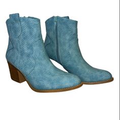 Step Into The World Of Sophistication And Elegance With The Chinese Laundry Unite Bootie Blue. Crafted With A Suede-Like Material, These Cowboy Booties Exude Luxury And Exclusivity. Make A Statement With Every Step And Elevate Your Style To New Heights.By Chinese Laundry. Manmade Materials. 3.5" Heel. Blue Ankle-high Summer Boots, Casual Blue Spring Booties, Casual Blue Booties For Spring, Blue Ankle-high Boots For Spring, Spring Blue Ankle Booties, Blue Ankle Booties For Spring, Blue Ankle-high Booties For Spring, Spring Blue Booties, Casual Blue Heels For Fall