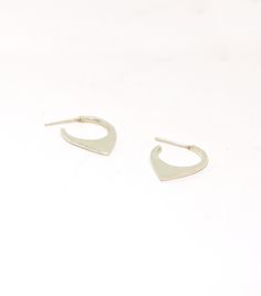 This pair of hoops are made from sterling silver and they come with butterfly ear backs. They are 20 mm long and 15 mm wide. If your ears can handle a bigger gauge I can make this pair a sleeper one without the need to have an ear back. If you prefer it smaller, have a look here: https://www.etsy.com/listing/628994062/small-hoops-sterling-silver-geometric?ref=shop_home_active_9&crt=1 Each pair is handmade to order and may slightly vary from the pictures. Please allow for subtle variations ma Small Hoop Sterling Silver Cartilage Earrings Tarnish Resistant, Tarnish Resistant Small Hoop Sterling Silver Cartilage Earrings, Tarnish Resistant Sterling Silver Small Hoop Cartilage Earrings, Minimalist Polished Sterling Silver Huggie Earrings, Modern Small Hoop Cartilage Earrings Tarnish Resistant, Silver Teardrop Minimalist Huggie Earrings, Minimalist Sterling Silver Tarnish-resistant Hoop Earrings, Modern Sterling Silver Teardrop Huggie Earrings, Modern Teardrop Sterling Silver Huggie Earrings