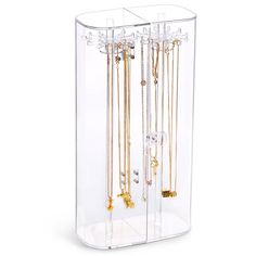 a clear display case with multiple necklaces and rings in the bottom half, on a white background