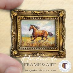 a painting of a horse running through a field with the words handmade frame and art