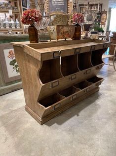 an old wooden cabinet with drawers in a store