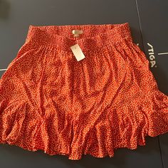 Loft, Medium, Burnt Orange With White Polkadot Skirt And Ruffled Hem. Never Worn. Great Condition. Polka Dot Bottoms For Vacation In Spring, Casual Polka Dot Skirt With Elastic Waistband, Summer Polka Dot Skirt With Elastic Waistband, Summer Polka Dot Mini Bottoms, Casual Polka Dot Mini Bottoms, Summer Casual Polka Dot Skirt, Summer Polka Dot Skirted Bottoms, Casual Polka Dot Tiered Skirt, Polka Dot Skirted Bottoms For Summer