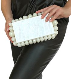 This Pearl Acrylic Clutch is a must-have for customers looking for an eye-catching and unique accessory. Its chic design fits a phone comfortably and features a removable strap. Dimensions: 8.75" x 5.25" Engagement Box, Pearl Clutch, Acrylic Clutch, Bridesmaid Thank You, Candy Cards, Bride Getting Ready, Bridesmaid Proposal Box, Life Of The Party, Sneaker Jewelry