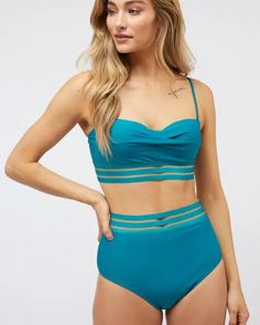 The Solid Two Piece Swimsuit is a classic and versatile swimwear option that combines timeless style with a comfortable fit. With its solid color design, it offers a minimalist yet sophisticated look for the beach or poolside. This two-piece swimsuit provides both ease of movement and a fashionable appearance, making it a dependable choice for enjoying the sun and water with confidence.Bottom's Measurements:Waist: 12.5"Length: 11.5"Model is wearing SmallHeight: 5'9"Bust : 32BWaist : 24"Hips : 34 Two Piece Swimsuit, Sun And Water, Enjoying The Sun, Black Swimsuit, Print Pattern, Timeless Style, Timeless Fashion, Color Design, The Beach