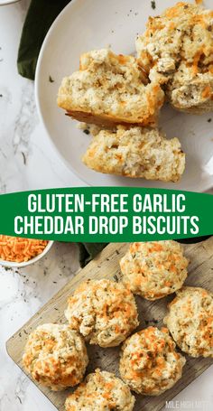 gluten - free garlic cheddar drop biscuits on a cutting board with carrots in the background