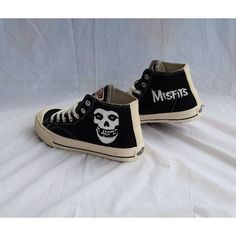 Introducing our 'Unique Hand-Painted Misfits Punk Rock Band Shoes: A Street Art Collection' - where fashion meets rebellion, and style gets a punk rock makeover. These custom sneakers are not just footwear; they are a canvas of individuality and self-expression. Our personalized gift to you is the freedom to wear your passion. Each pair is a masterpiece, meticulously hand-painted with iconic Misfits artwork, infusing punk rock style into every step you take. These shoes are a tribute to the legendary rock band, capturing their spirit in wearable art. Elevate your fashion game with these running shoes that embody the rebellious ethos of punk rock culture. They are more than just sneakers; they are a statement. Perfectly blending street art and rock 'n' roll vibes, these shoes are your ticke Grunge Lace-up Sneakers For Streetwear, Grunge Low-top Sneakers For Streetwear, Casual Black Sneakers With Graffiti Print, Graffiti Print Sneakers For Streetwear, Black Punk Sneakers For Concert, Black Low-top Sneakers With Graffiti Print, Black Round Toe Sneakers For Concert, Black Punk Sneakers For Streetwear, Misfits Artwork