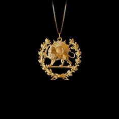 Embrace the powerful symbolism of the Lion and Sun with this stunning pendant. Crafted in solid gold, this pendant features a detailed design of a majestic lion alongside the radiant sun, representing strength, courage, and vitality. 𝗣𝗲𝗻𝗱𝗮𝗻𝘁 𝗱𝗲𝘁𝗮𝗶𝗹𝘀 This pendant is crafted in real solid gold. * Made in USA * 𝗛𝗲𝗶𝗴𝗵𝘁: 1.15" (29 mm) x 𝗪𝗶𝗱𝘁𝗵: 1.1" (28.5 mm)  *not including the bail dimensions * 𝗠𝗮𝘁�𝗲𝗿𝗶𝗮𝗹: 14K and 18K solid gold * 𝗙𝗶𝗻𝗶𝘀𝗵: polished * 𝗪𝗲𝗶𝗴𝗵𝘁: Lion Accessories, Lion Pendant Gold, Sun Pendant Gold, Lion And Sun, Lion Queen, Persian Jewelry, Gold Coin Jewelry, Lion Necklace, Majestic Lion