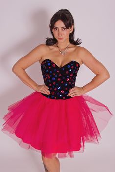 This is such a fun and flirty party dress from the early 2000's. The top portion is a fitted black leather sweetheart neckline with boning to really accentuate your shape. The velvet has blue and pink sequins that catch light beautifully. The bottom has three full and vibrant layers of pink tulle. It's in great vintage condition. Please note below for sizing.  SIZE 7/8 LENGTH 29" BUST 34" WAIST 26" HIPS OPEN Emo Prom, Jessica Mcclintock Dress, Burlesque Costume, Party Mini Dress, Hip Openers, High Waisted Pencil Skirt, Barbie Party, Jessica Mcclintock, Gunne Sax