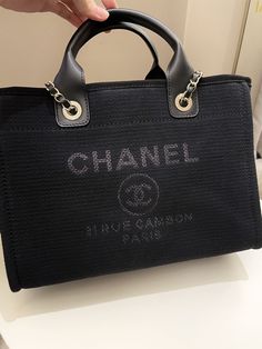 Chanel Deauville Shopper ToteBlack SHWSize 32 x 24 x 18 cmChain drop 32 cmMicrochipJuly 2023NewIncludes full set box (box not for international shipping), dust bag and receiptPrice now 5999 sgd 4520 usd CN5477-01 Chanel Deauville Tote Outfit, Chanel Large Tote Bag, Chanel Timeless Tote, Chanel Grand Shopping Tote, Chanel Tote Bag, Ulysse Nardin, Chanel Tote, Gold Ounce, Chanel Deauville Tote Bag