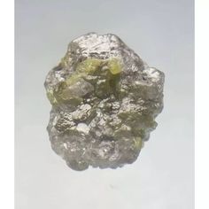 a close up of a rock on a white background