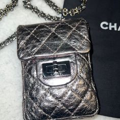 Authentic Chanel Micro Mini Reissue Crossbody Super Limited Edition Design In Beautiful Metallic Silver Aged Calfskin Leather With Silver Hardware. Turn-Lock Closure At Front. Gorgeous Interlocking Cc On Inside Of Flap. Long Mademoiselle Chain Is In Great Condition, Can Be Worn As Crossbody Or On Shoulder. No Cracks Or Wear To Corners Of Bag. Bag Is Preloved And Over All In Good Condition. Some Wear And Light Scratches. Shoulder Drop 24” Comes With Original Dust And Authenticity Card Silver Age, Micro Mini, Bag Bag, Silver Hardware, Limited Editions, Calf Skin, Metallic Silver, Limited Edition, Chanel