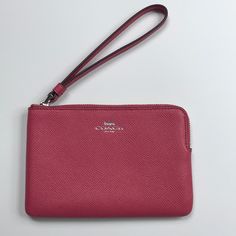 Never Used Small Pink Coach Wristlet With Silver Details 6x4 Inches Classic Pouch Wristlet With Zipper Closure, Coach Pouch Wristlet For Everyday Use, Coach Bags With Wrist Strap And Rectangular Shape, Classic Pouch Wristlet For Daily Use, Classic Wristlet Pouch For Daily Use, Elegant Pink Wristlet For Everyday Use, Coach Wristlet With Zipper Pouch For Travel, Classic Clutch Wristlet For Daily Use, Classic Wristlet With Zipper Pouch For Daily Use