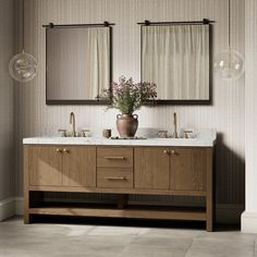 a bathroom with two sinks and mirrors in it's center area, along with vases filled with flowers