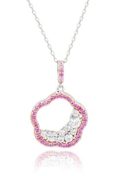 An elegant sterling silver necklace suspends an open flower pendant framed by dainty pink sapphires with lab-created white sapphires for dazzling sparkle. 18" length Sterling silver/pink sapphire/lab-created white sapphire Imported Pink Cubic Zirconia Flower Pendant Necklace, Pink Sterling Silver Necklace With Brilliant Cut, Pink Sterling Silver Necklaces With Brilliant Cut, Silver Pink Sapphire Necklace Gift, Silver Pink Sapphire Necklace For Gift, Fine Jewelry Pink Flower Pendant Necklace, Pink Flower Pendant Necklace In Fine Jewelry Style, Pink Flower Pendant Necklace Fine Jewelry, Open Flower