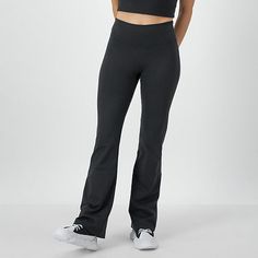 Cut to a mid-rise this pair of Champion women's pants are made from soft recycled fabric with stretch for added comfort. They have a smooth elastic-waistband with slim fitting flare legs. Wear them with a sports bra and grippy socks to move into yoga poses.Front Style: Flat FrontFeatures: Comfort WaistbandClosure Type: Full ElasticFit: Slim FitRise: Mid RiseFiber Content: 78% Recycled Polyester, 22% SpandexFabric Description: WovenInseam: 31 1/2 InLeg Style: Flare LegCare: Tumble Dry, Machine Wa Sporty High Stretch Bottoms With Comfort Waistband, High Stretch Sporty Bottoms With Comfort Waistband, Solid Color Elastane Sports Pants, Straight Leg Bottoms With Elastic Waistband And Minimal Stretch, Fitted Sweatpants With Ribbed Waistband And Straight Leg, Solid Compressive Mid-rise Pants, 4-way Stretch Elastane Gym Pants, Yoga Pants With Compressive Comfort Waistband, Mid-rise Elastane Gym Pants