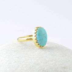 Arizona Turquoise Ring, Arizona Turquoise 10x14mm Oval Zig Zag Bezel Gemstone Ring, Sterling Silver Ring, Wedding Gift For Women Item Code: BF5041 Metal: 925 Sterling Silver Plating: 18k Gold Plated Stone Detail:- Arizona Turquoise 10x14mm Oval * Please note that there will be slight variations in stone texture and color shades in the actual product that you receive. Stone quality or grade will be same. * All our jewelry is Micron Plated which is higher quality as compared to Standard Plating NO Adjustable Gold Turquoise Ring For Wedding, Gold Turquoise Oval Ring For Wedding, Adjustable Oval Turquoise Ring For Wedding, Adjustable Turquoise Gemstone Ring For Weddings, Gold Oval Turquoise Ring For Wedding, Gold Oval Turquoise Wedding Ring, Gold Turquoise Wedding Ring, Handmade Turquoise Wedding Ring, Green Turquoise Oval Ring For Wedding