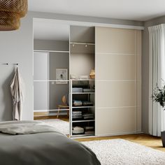 a bedroom with an open closet and white carpet