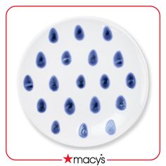 a white plate with blue dots on it